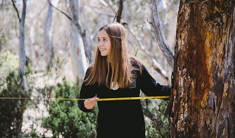 Student measuring a sample quadrant during an excursion activity in Kosciuszko National Park. Photo: Remy Brand © DPE