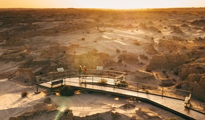 Aerial view of Red Top lookout and sweeping sand dunes at sunset. Credit: Melissa Findley/DCCEEW © Melissa Findley