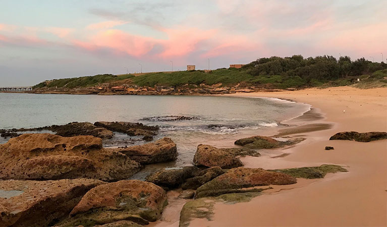 Sunset at Congwong Beach swimming area in the La Perouse area of Kamay Botany Bay National Park. Photo: Stacy Wilson © DPE